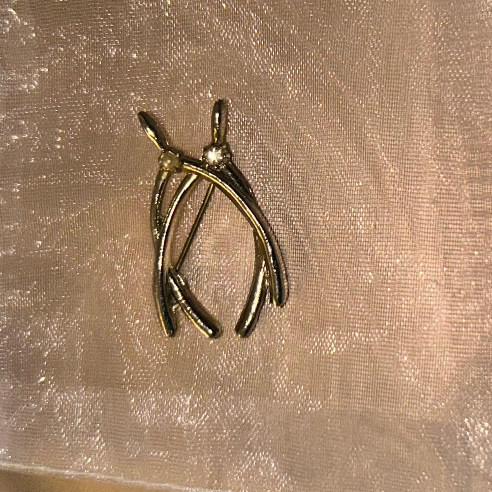 Gold tone Wishbone Pendant